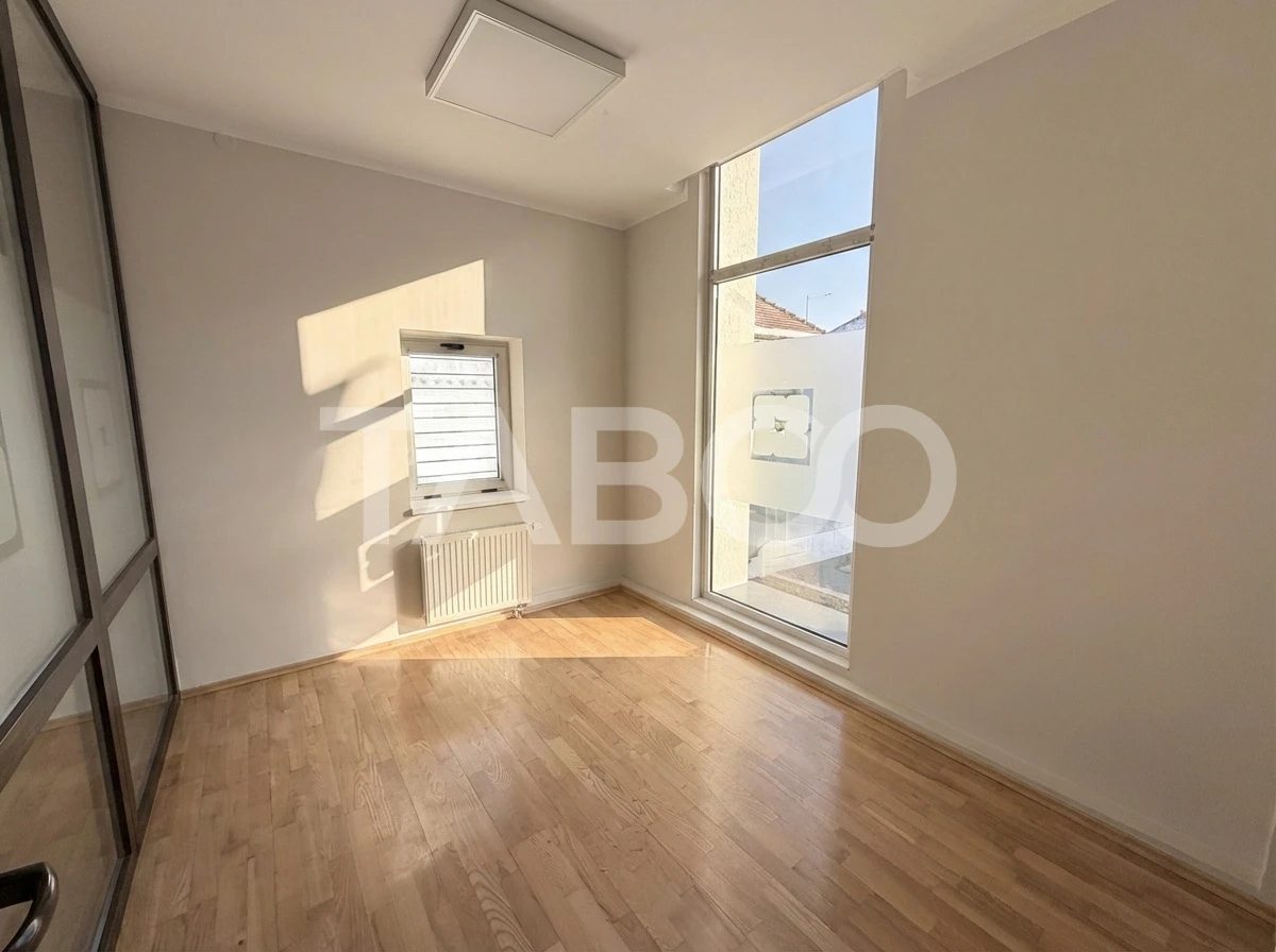 Cladire de birouri cu spatiu comercial la parter si 6 locuri parcare - 8