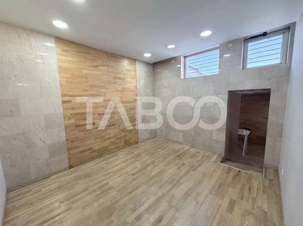 Cladire de birouri cu spatiu comercial la parter si 6 locuri parcare - 6