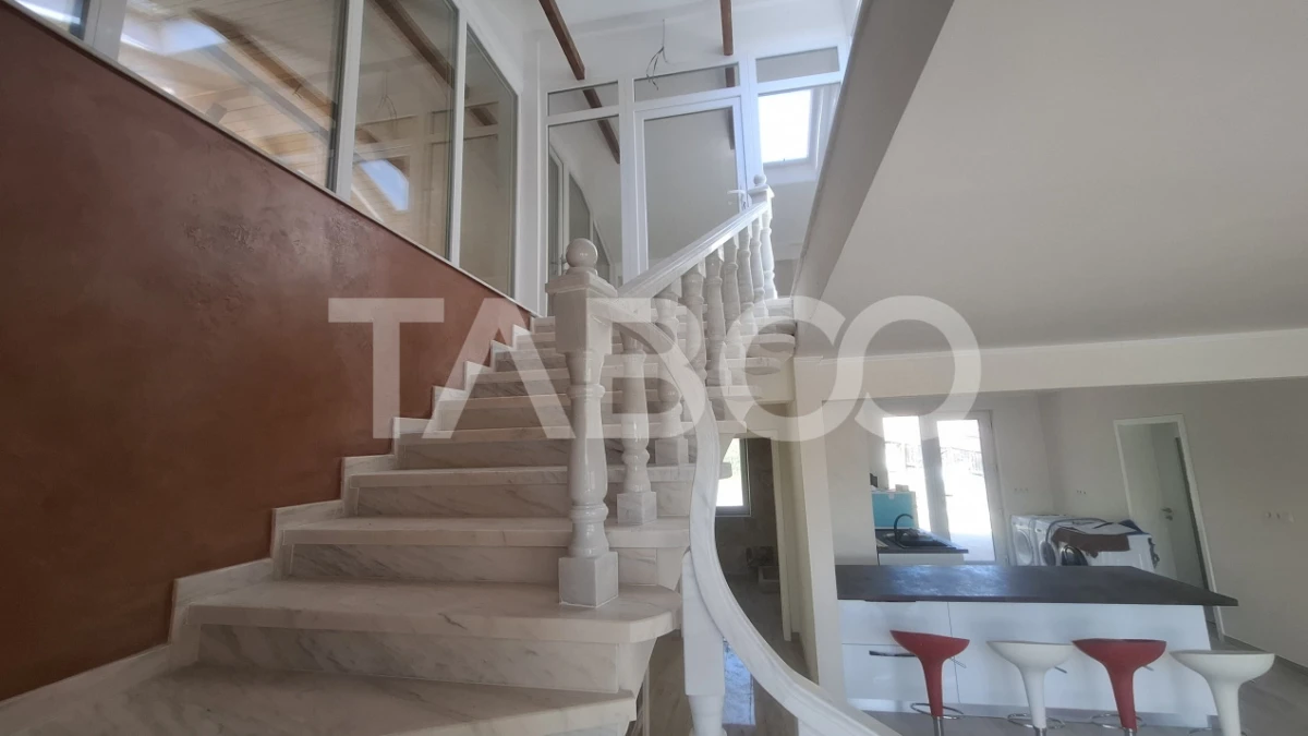 Casa de vanzare 405 mp utili 2 garaje 250 mp terase Slimnic Sibiu - 9