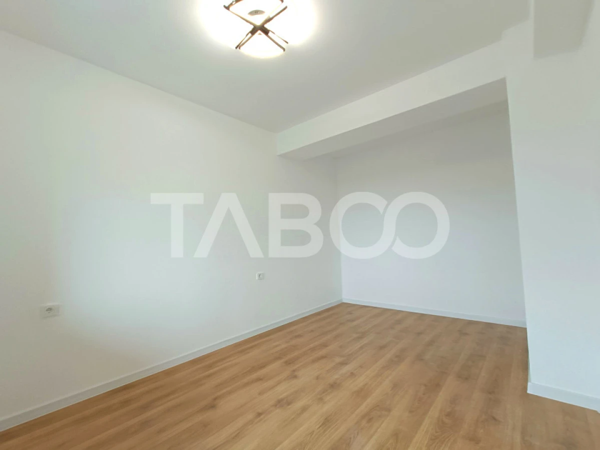 Apartament spatios 3 camere 2 bai - incalzire pardosea - parcare - 9