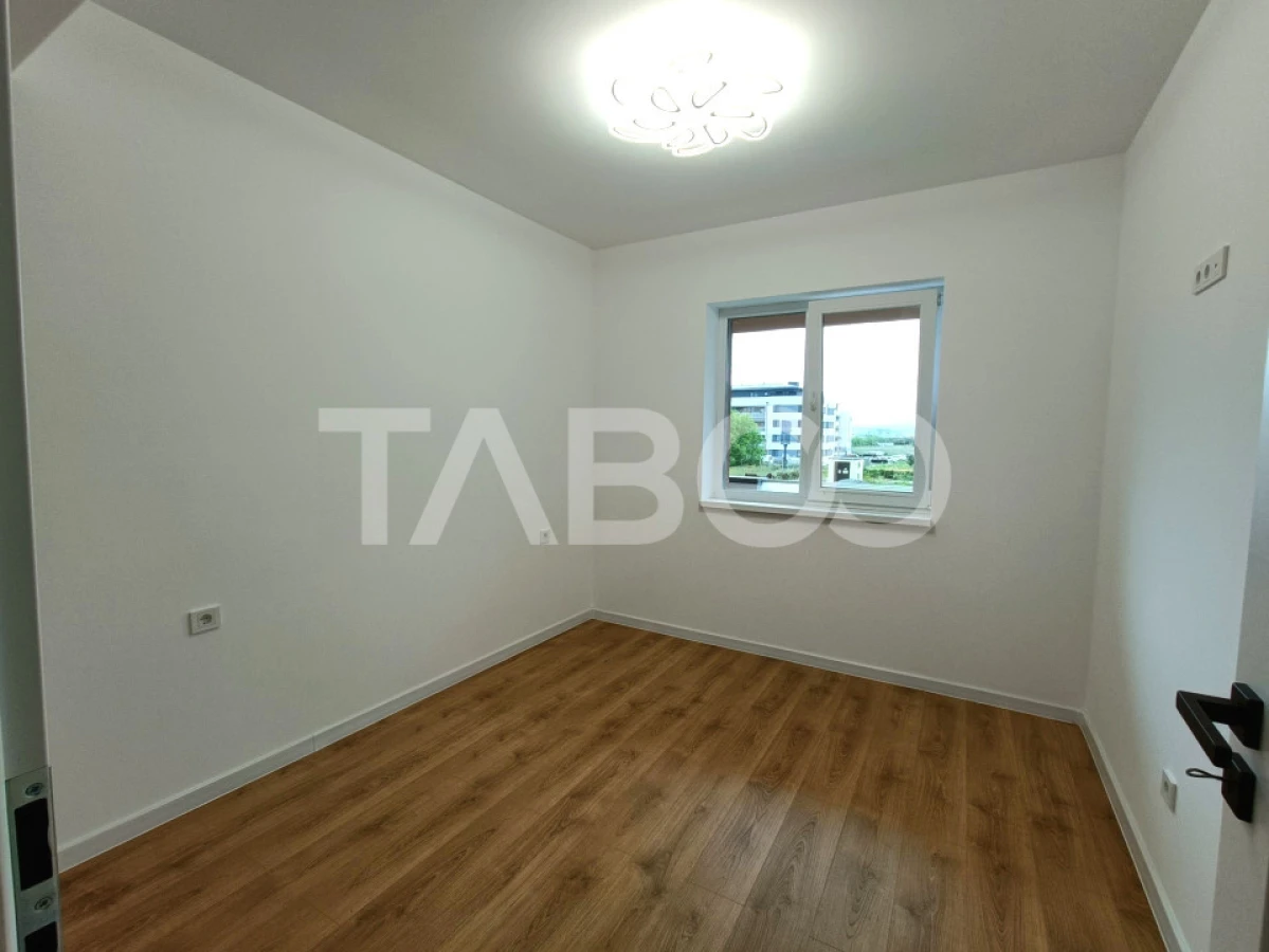 Apartament spatios 3 camere 2 bai - incalzire pardosea - parcare - 6