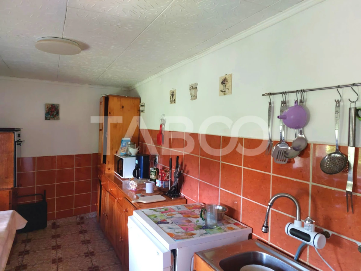 Casa 214 mp utili singur in curte 800 mp teren zona centrala Cisnadie - 9