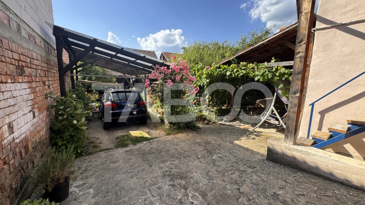 Casa de vanzare cu curte spatioasa loc relaxare si gradina Cornatel - 9