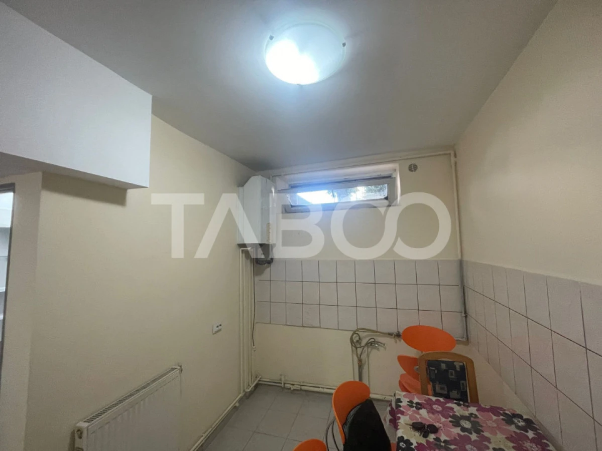 Garsoniera renovata decomandata 32 mp utili in Sibiu - 10