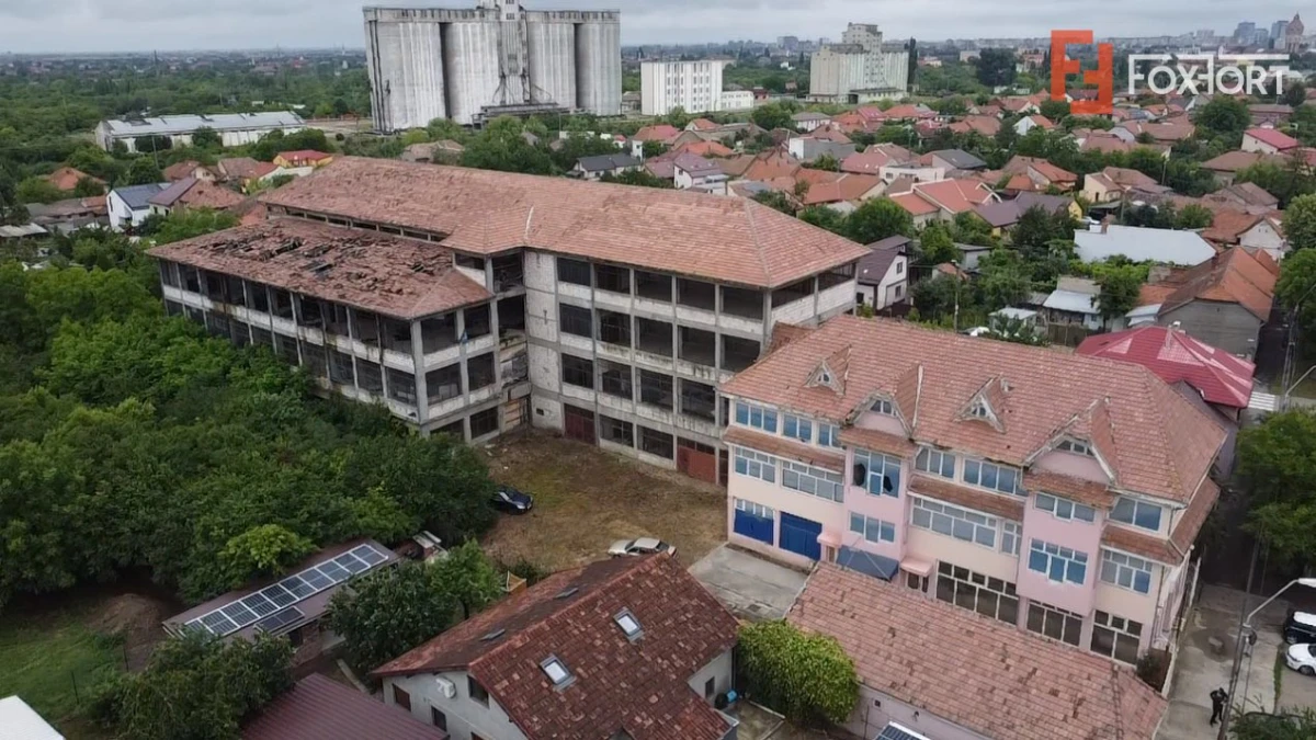 Cladire productie Parter + 3 niveluri, teren intravilan 9738 mp in Timisoara - 1