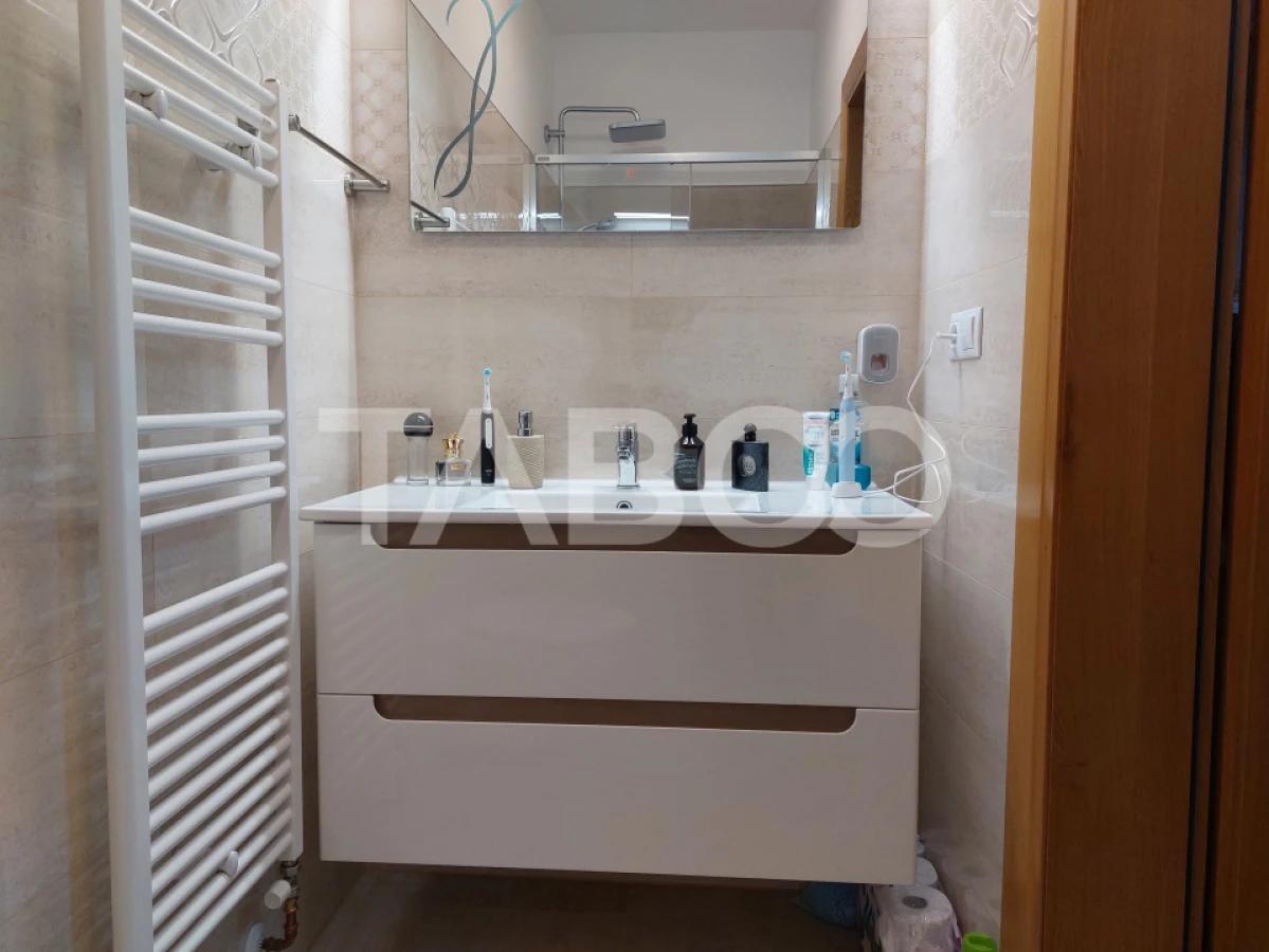 Casa 109 mp 4 camere pivnita terasa loc parcare curte comuna Cisnadie - 9