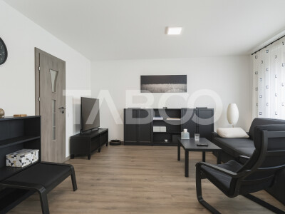 Casa de vanzare in Zavoi cu 3 camere 2 bai curte libera de 50 mp