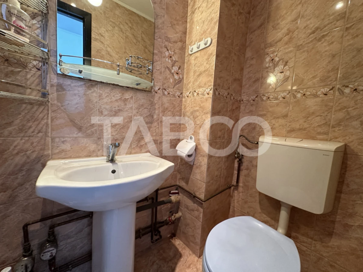 Apartament decomandat 3 camere 2 bai 68 mpu etaj 3 Calimanesti Valcea - 7