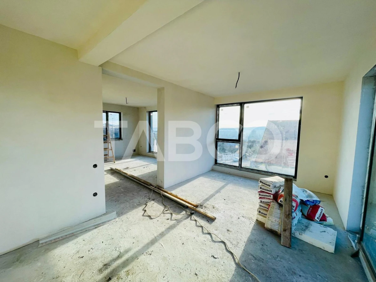 Duplex cu 2 garaje semifinisat de vanzare in cartierul Dambul Rotund - 1