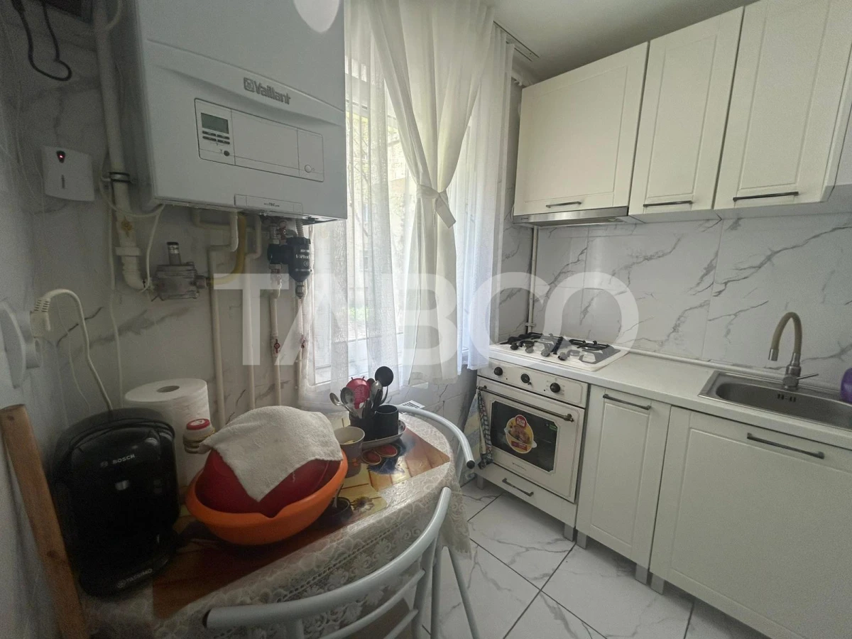 Garsoniera decomandata la parter inalt utilata si mobilata de vanzare - 9