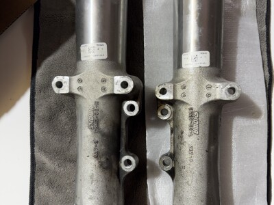 Lower Fork Ends/ suporti jambe furca fata Harley Davidson touring