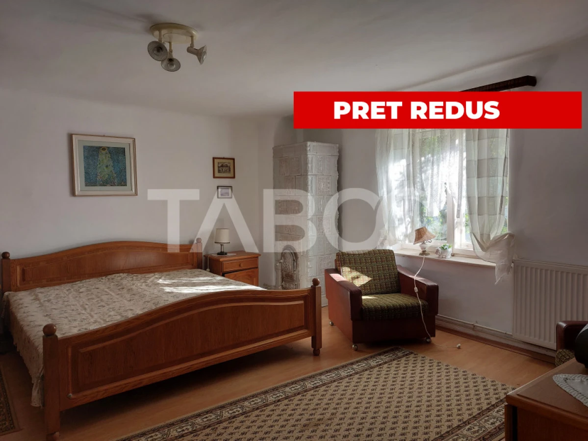 Casa de vanzare cu 2 apartamente separate si teren 500 mp Cisnadioara - 1
