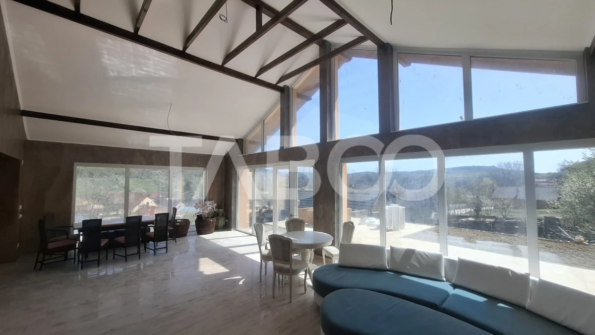 Casa de vanzare 405 mp utili 2 garaje 250 mp terase Slimnic Sibiu - 1