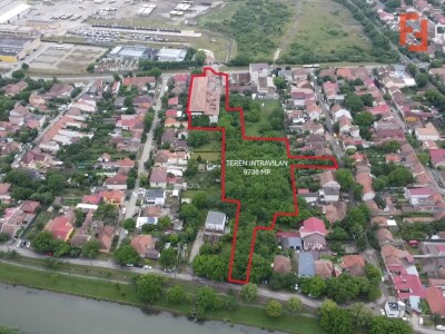Teren intravilan 9738 mp, cu iesire pe 3 strazi - zona Dambovita