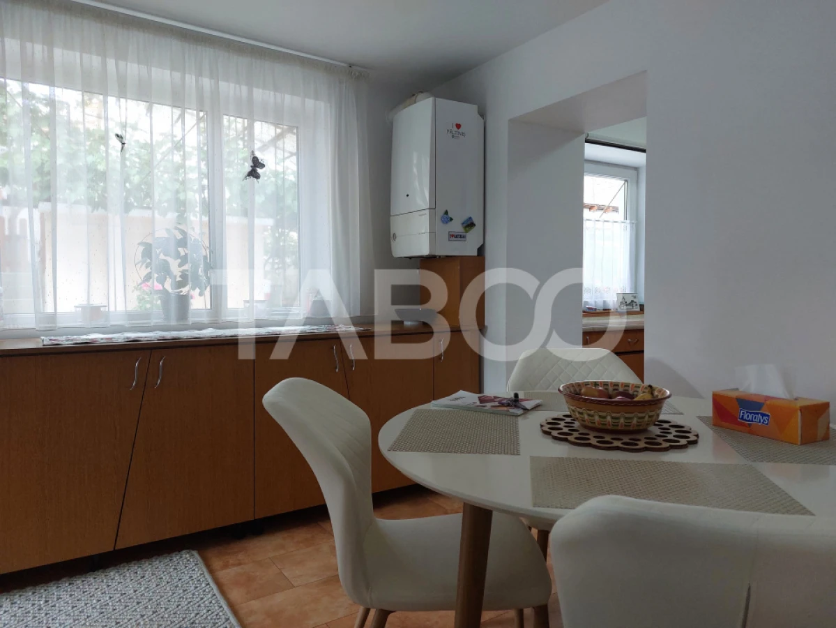 Casa 109 mp 4 camere pivnita terasa loc parcare curte comuna Cisnadie - 9