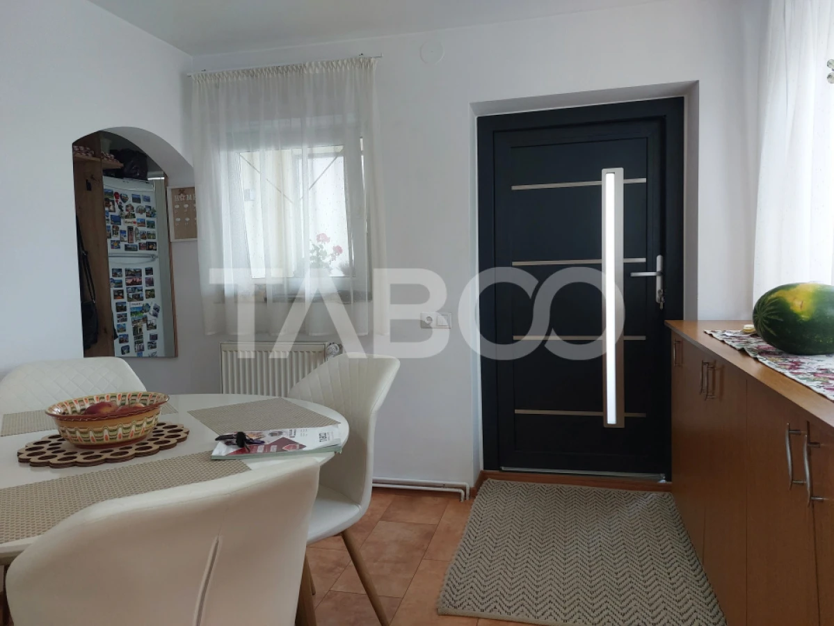 Casa 109 mp 4 camere pivnita terasa loc parcare curte comuna Cisnadie - 7