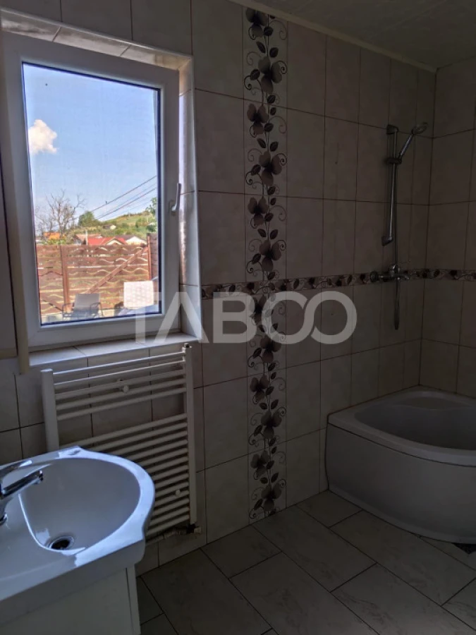 Casa de vanzare cu garaj si curte 147 mpu in Sura Mare Sibiu - 9