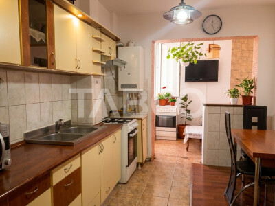 Apartament decomandat 3 camere 2 bai etaj 3 balcon zona buna Cisnadie
