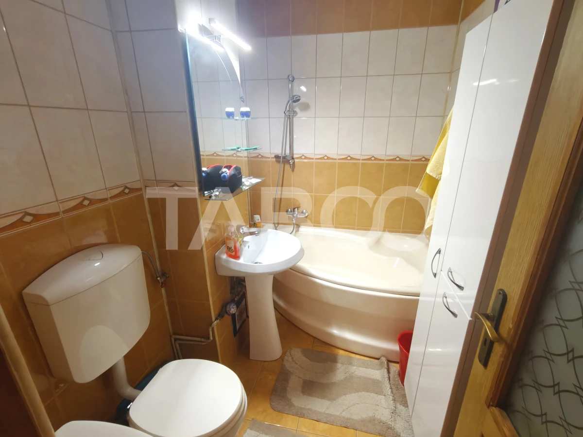 Apartament 4 camere 2 bai 2 balcoane -pivnita - etaj 1 - zona Turnisor - 8