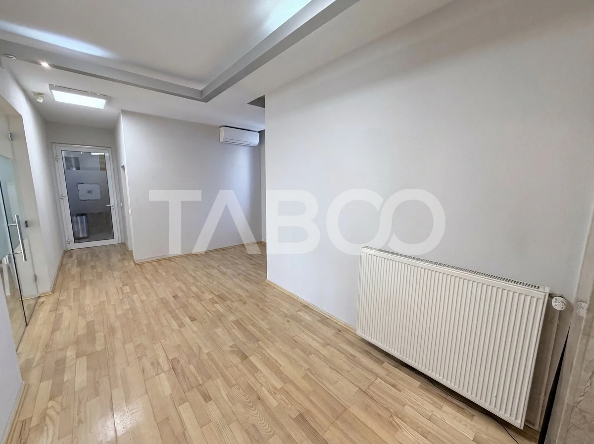 Cladire de birouri cu spatiu comercial la parter si 6 locuri parcare - 9