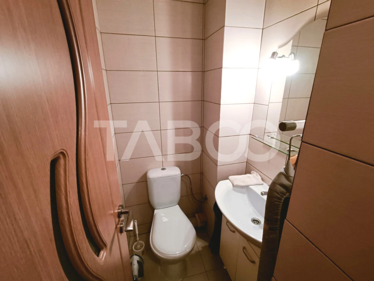 Apartament cu 3 camere 2 bai 63 mp utili etaj 1 in Sibiu zona Turnisor - 10