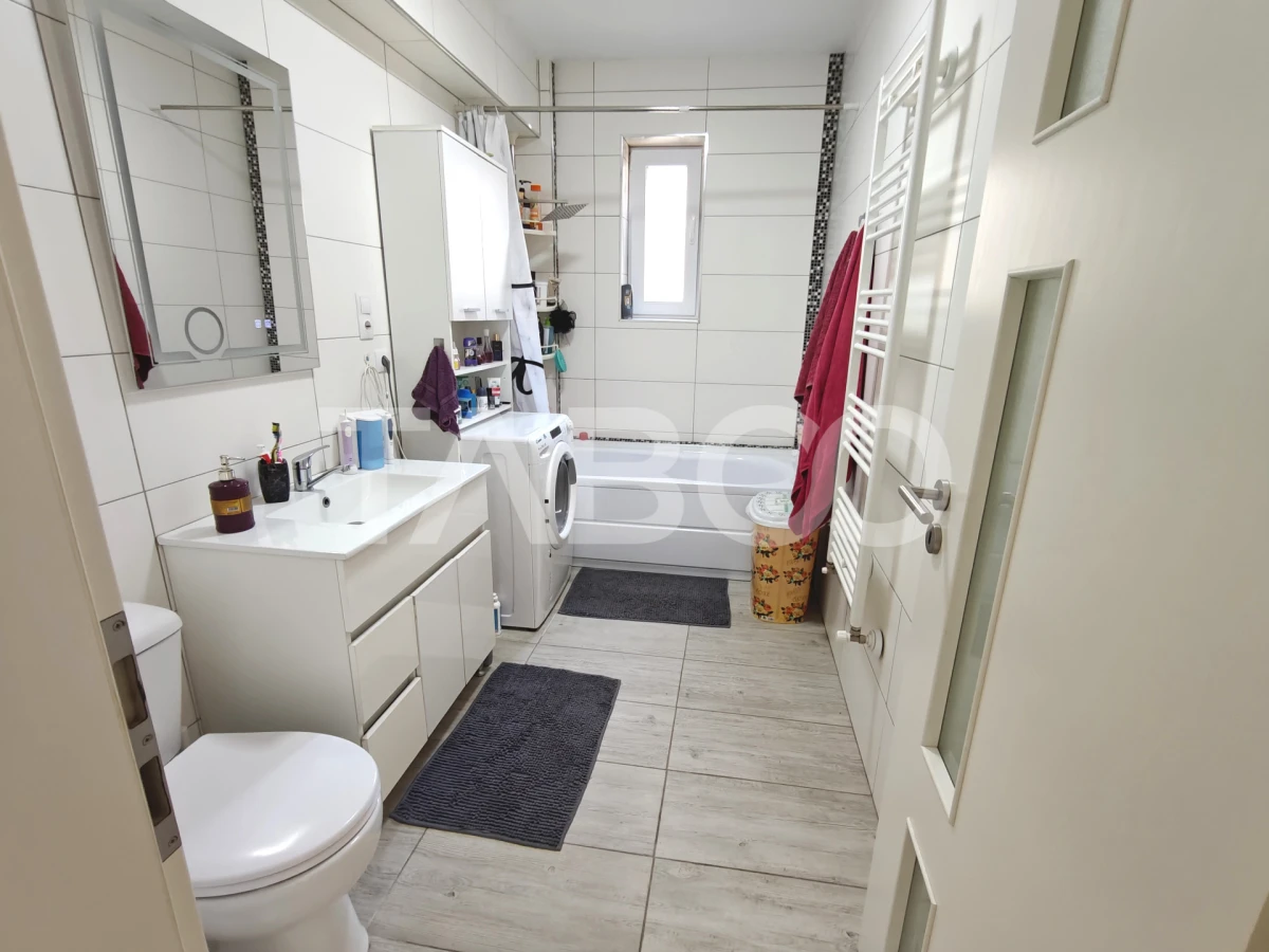 Apartament cu pacare subterana 3 camere 2 bai - zona linistita - 70 mp - 7